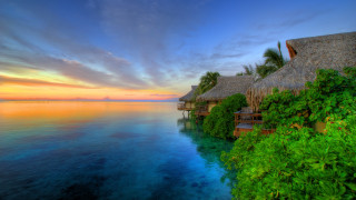 Tropical resort sunset beach ocean - roof free wallpaper