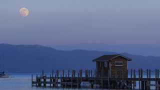 Full moon dock boat cityscape - alan sutherland free wallpaper