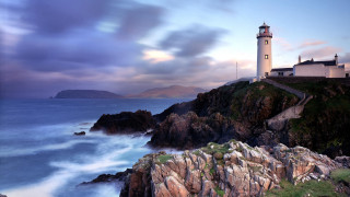 Lighthouse cliff ocean sunset clouds - anne rigney free wallpaper
