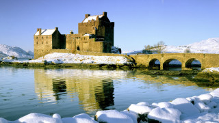 Castle bridge snowy water mountains - covered ground free wallpaper