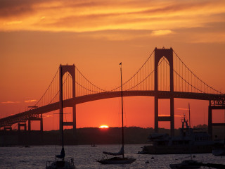 Bridge water boats sunset dawn - a sun setting behind free wallpaper