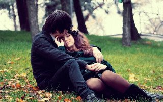 Man woman sitting grass leaves - the ground and trees free wallpaper