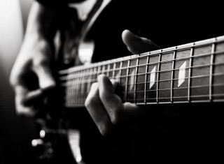 Person playing guitar fingers strings 2 - photo free wallpaper