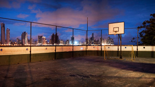 Basketball court city skyline night - free city wallpaper for desktop