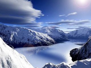 Snowboarder jump mountain lake air - a snowboarder free wallpaper