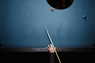 Person holding pool stick table - free sports wallpaper for desktop