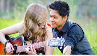 Man woman grass playing guitar 3 - adrian zingg free wallpaper