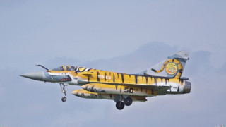 Yellow silver fighter jet cloudy - a propeller free wallpaper