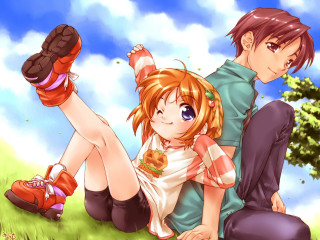 Couple sitting on grass under - field next free wallpaper