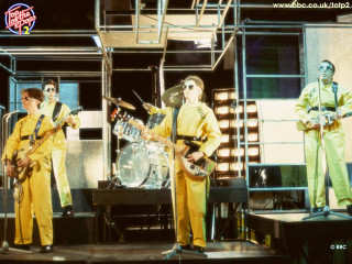 Yellow men stage guitars drums - guitar free wallpaper