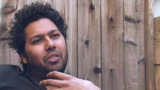 Curly hair man black shirt - bikash bhattacharjee free wallpaper