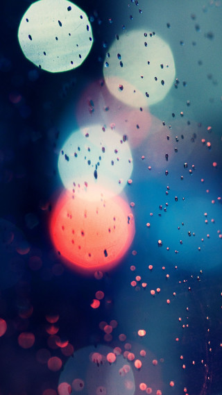 Blurry raindrops window streetlight trafficlights - a window free wallpaper for mobile