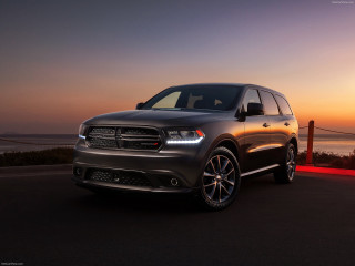Grey dodge suv ocean sunset - a road near the ocean free wallpaper