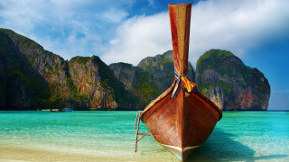 Boat beach mountain ocean bridge - a sandy beach next free wallpaper