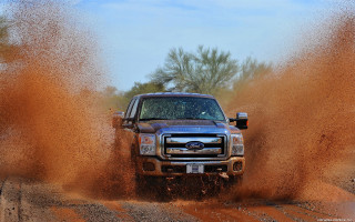 Truck driving dirt field dirt - a truck driving free wallpaper