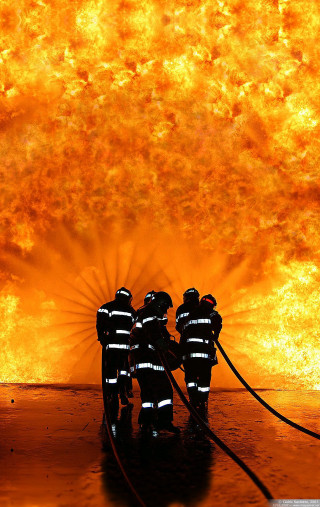 Firemen building flames raging group - flame free wallpaper for mobile