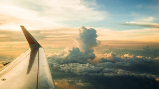 Plane wing clouds sunset dawn - liminal free wallpaper