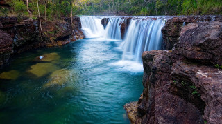 Waterfall river running through waterfall - a waterfall in the middle free wallpaper