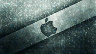 Apple logo wall blue speckles - photo of an apple logo free wallpaper
