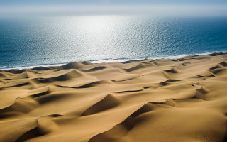 Ocean desert sand dune sun - a view of the ocean free wallpaper