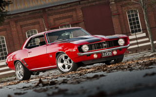 Red car 3d render city - photoreal free wallpaper