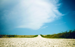 Liminal road field clouds blue - liminal space free wallpaper