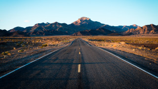 Long road mountains city sky - straight free wallpaper