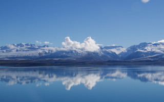Mountain lake clouds cityscape beach - a lake in the foreground free wallpaper