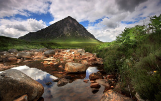 Mountain stream rocks cloudy sky 2 - david paton free wallpaper