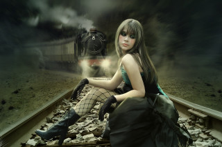 Woman sitting train track background - a train track free wallpaper for desktop