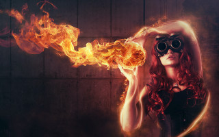 Fiery woman goggles fireball burnt - a fire ball free wallpaper