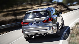 Silver bmw suv driving forest 2 - side profile free wallpaper