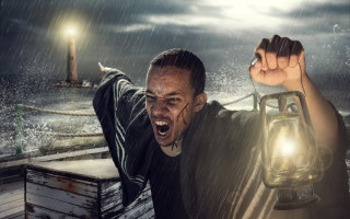 Man lantern rain lighthouse boat - free rain wallpaper