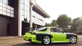 Green car building bike rack - extreme free wallpaper