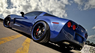 Blue sports car cloudy sky 12 - the road free wallpaper