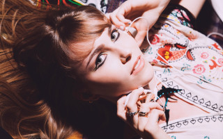 Woman laying on ground elegant - a shirt free wallpaper