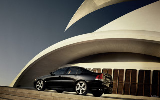 Black car curved roof military - a concrete wall free wallpaper