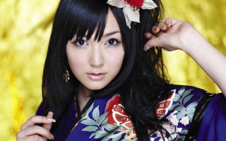 Woman flower portrait yellow background - a red flower free wallpaper