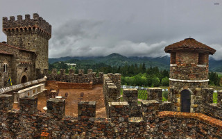 Castle tower gate mountains sky - romanesque free wallpaper