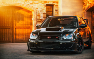 Black car brick building wooden - golden hour free wallpaper