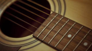 Guitar frets closeup black background - ella guru free wallpaper