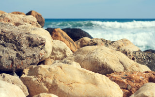 Rocks water wave beach mountains - deep free wallpaper