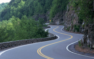 Curved road yellow line mountain - turnaround free wallpaper