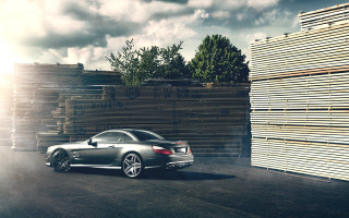 Car wooden wall cloudy sky - free cars wallpaper
