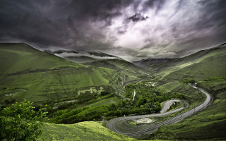 Winding road green valley cloudy 2 - road free wallpaper