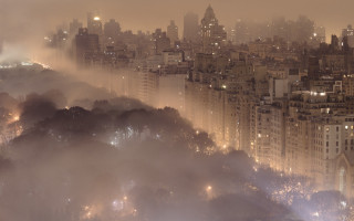 Foggy city skyline night mountain - fog free wallpaper