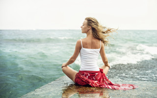 Woman sitting ledge water hair - sea free wallpaper