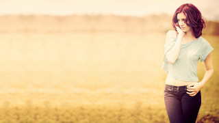 Woman field phone denim sunset - a blurry background of grass and trees free wallpaper