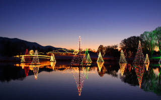 Glowing lake christmas lights mountains - christmas free wallpaper