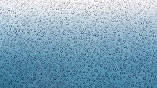 Raindrop window blue sky macro 2 - a macro photograph free wallpaper for desktop